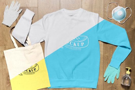 Free Top View Hoodie Mock-Up With Gloves, Mask And Hand Sanitizer Psd