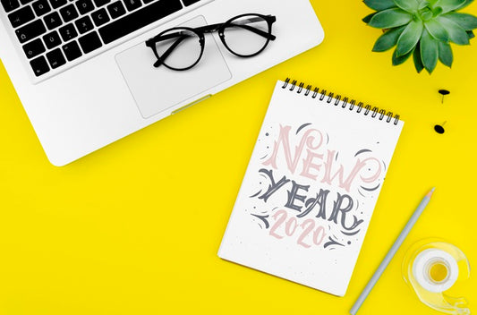 Free Top View Laptop And Mock-Up With New Year Party Psd