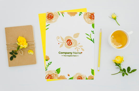 Free Top View Lovely Paper Mock-Up With Floral Assortment Psd