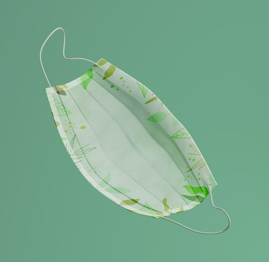 Free Top View Mask On Green Background Psd