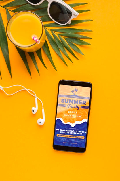 Free Top View Mobile Phone With Earphones And Orange Juice Psd