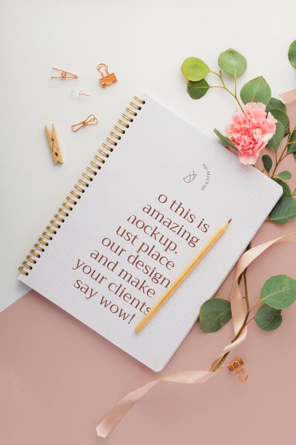 Free Top View Notebook And Flower Psd