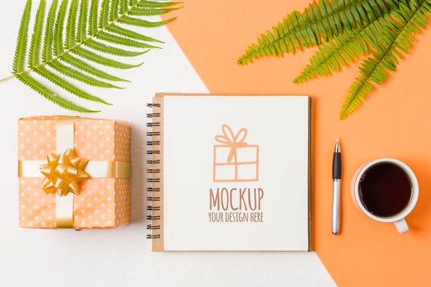 Free Top View Notebook Mock-Up Next To Birthday Gift Psd