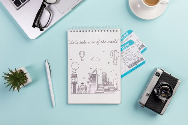 Free Top View Notebook With Flight Tickets And Camera Psd