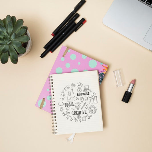 Free Top View Notebook With Pens Psd