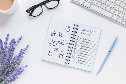 Free Top View Notepad With List On The Desk Psd