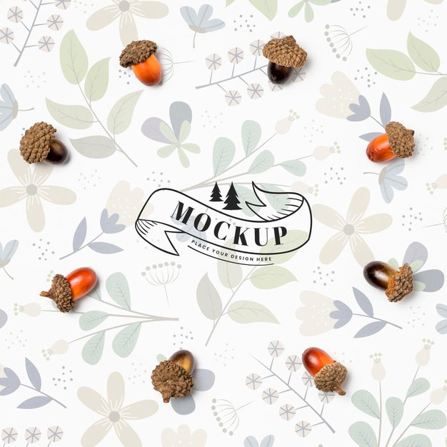 Free Top View Of Acorns Mock-Up With Leaves Psd