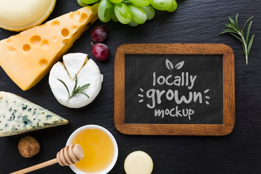 Free Top View Of Assortment Of Locally Grown Cheese With Blackboard Mock-Up Psd