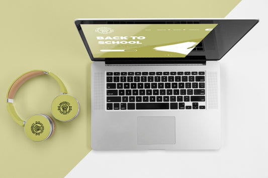 Free Top View Of Back To School Headphones With Laptop Psd