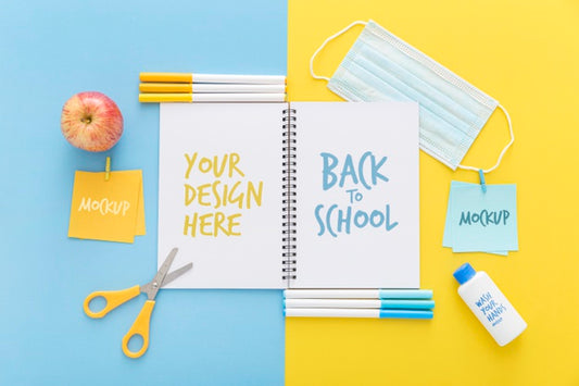 Free Top View Of Back To School Notebook With Scissors And Medical Mask Psd