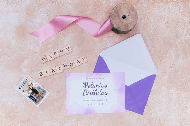 Free Top View Of Birthday Card Envelope With Ribbon Psd