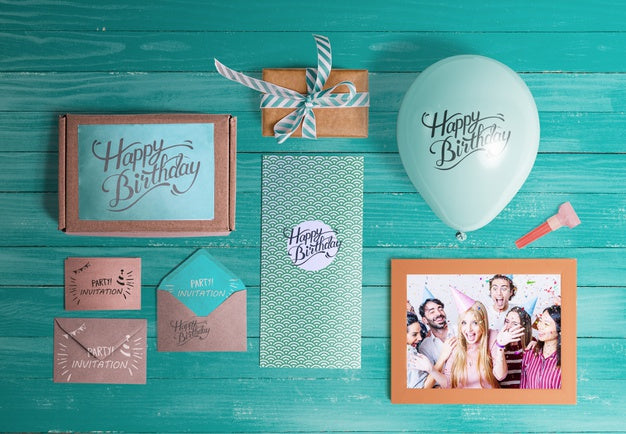 Free Top View Of Birthday Elements On Wooden Table Psd