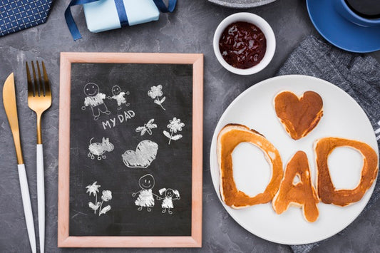 Free Top View Of Blackboard For Fathers Day With Pancakes And Muffin Psd