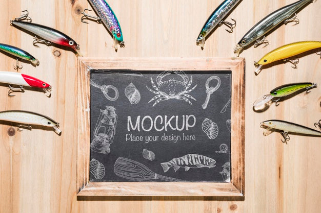 Free Top View Of Blackboard With Fish Bait And Frame Psd