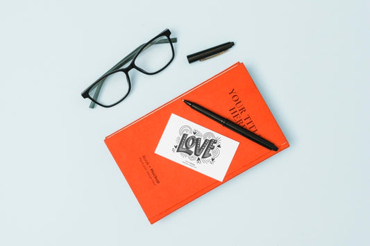 Free Top View Of Book With Glasses And Pen Mock-Up Psd