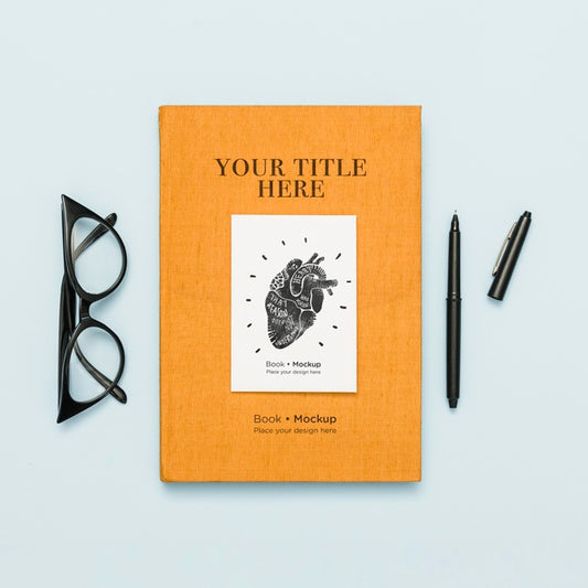 Free Top View Of Book With Pen And Glasses Psd