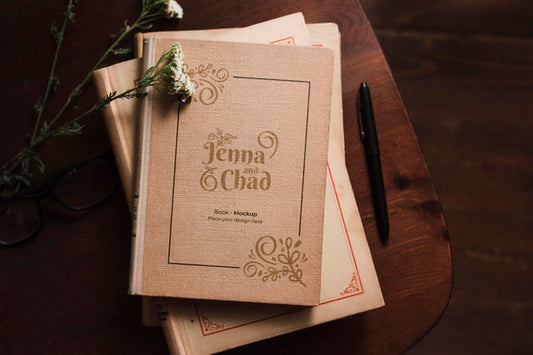 Free Top View Of Bookss With Pen And Flowers Psd