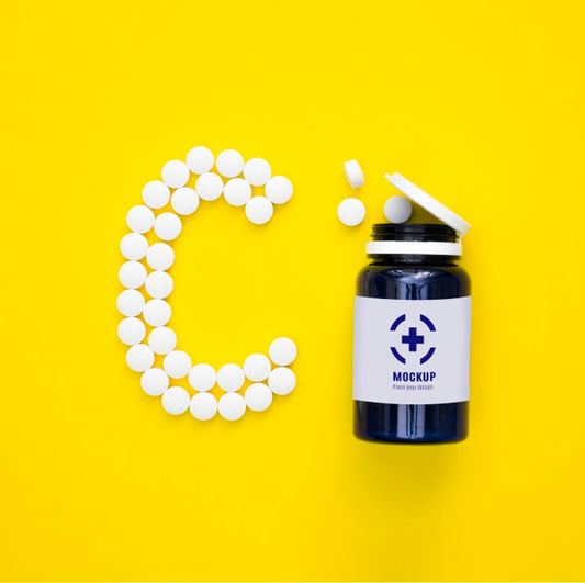 Free Top View Of Bottle With Pills In Shape Of C Psd