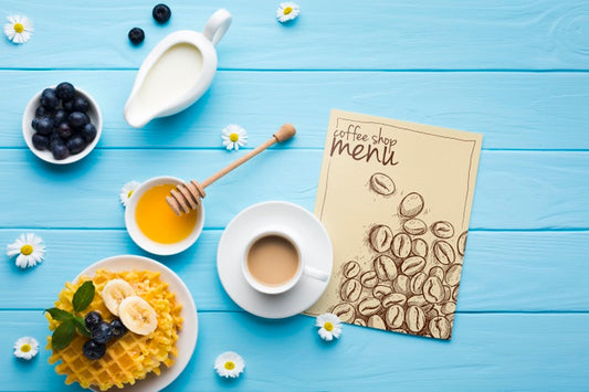 Free Top View Of Breakfast Food With Waffles And Coffee Psd