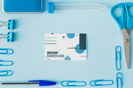 Free Top View Of Business Card Mock-Up With Office Essentials Psd