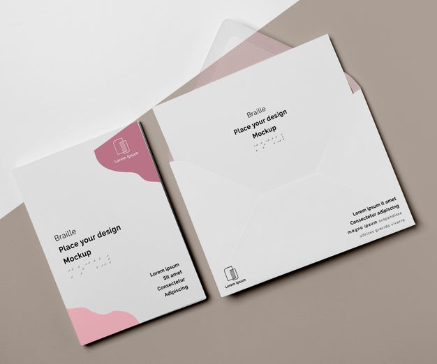 Free Top View Of Business Card With Braille And Envelope Psd