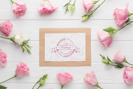 Free Top View Of Card Mock-Up With Pink Roses Psd