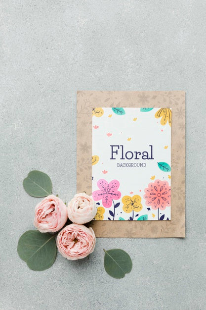 Free Top View Of Card With Spring Roses And Leaves Psd