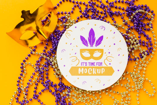 Free Top View Of Carnival Mask And Beads Psd