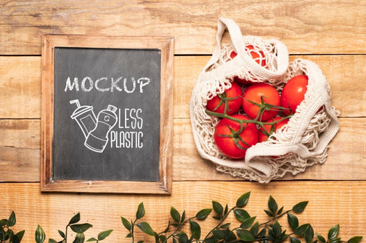 Free Top View Of Chalkboard And Tomatoes In Reusable Bag Psd