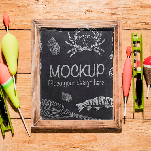Free Top View Of Chalkboard With Fishing Baits Psd