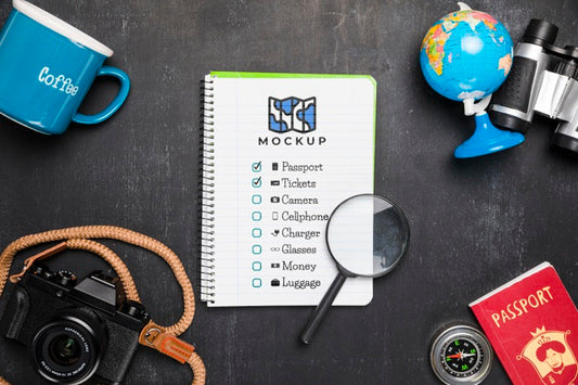 Free Top View Of Checklist With Magnifying Glass And Camera For Traveling Psd