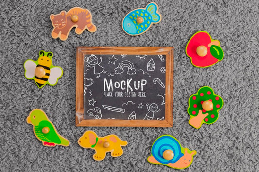 Free Top View Of Children Toys With Chalkboard Psd