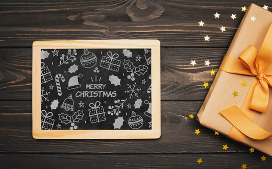 Free Top View Of Christmas Concept Chalkboard On Wooden Table Psd
