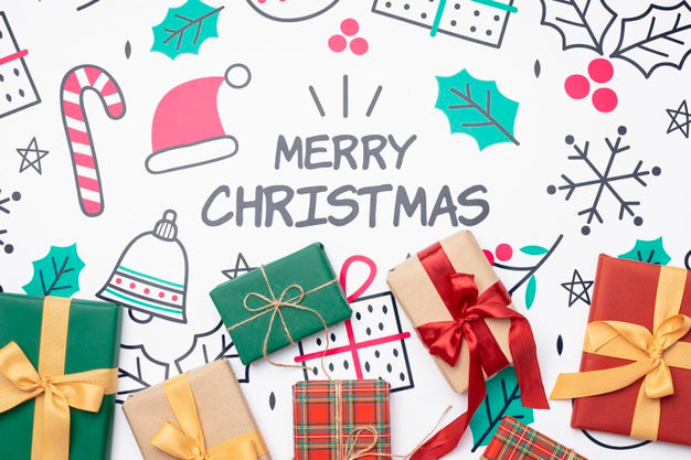 Free Top View Of Christmas Concept With Gifts Psd