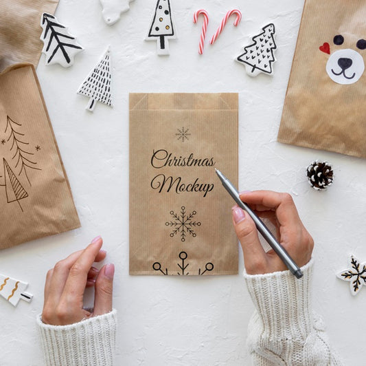 Free Top View Of Christmas Crafts With Paper Bag Psd