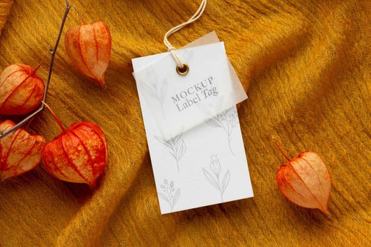 Free Top View Of Clothing Label Mock-Up On Orange Textile Psd