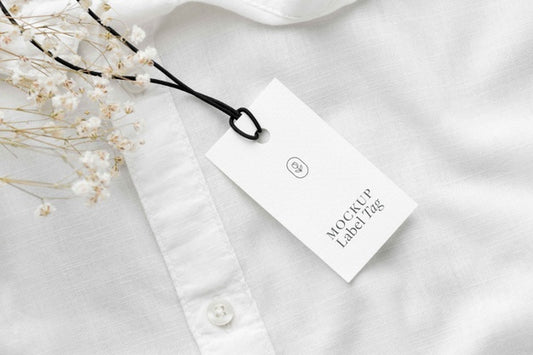 Free Top View Of Clothing Label On White Shirt Fabric Psd