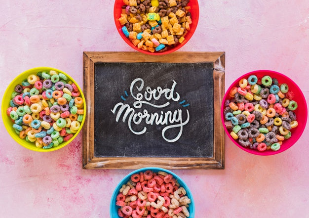 Free Top View Of Colorful Cereals And Chalkboard On Plain Background Psd