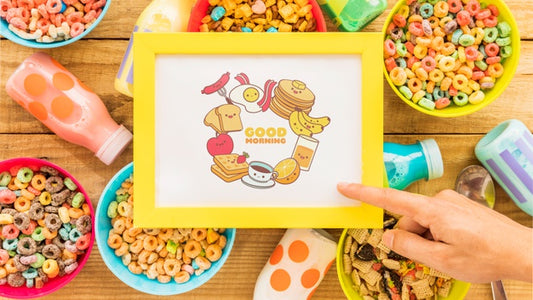 Free Top View Of Colorful Cereals And Frame On Wooden Table Psd