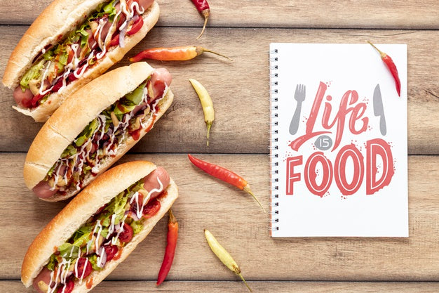 Free Top View Of Delicious Hot Dog Mock-Up On Wooden Backgoround Psd