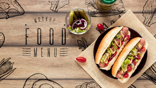 Free Top View Of Delicious Hot Dogs On Wooden Table Psd