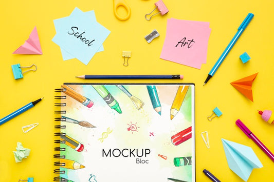 Free Top View Of Desk Surface With Notebook And Pencils Psd