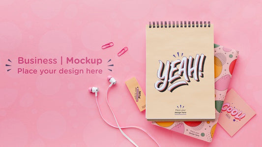 Free Top View Of Desk With Earphones And Notebooks Psd