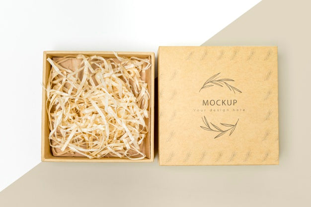 Free Top View Of Eco-Friendly Gift Box With Shredded Paper Mock-Up Psd