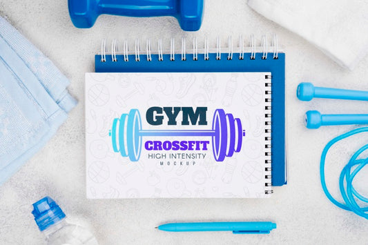 Free Top View Of Fitness Notebook With Jumping Rope And Pen Psd