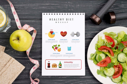 Free Top View Of Fitness Notebook With Plate Of Salad Psd