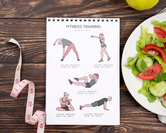Free Top View Of Fitness Notebook With Salad And Measuring Tape Psd