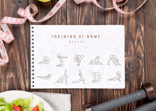 Free Top View Of Fitness Notebook With Weights And Salad Psd