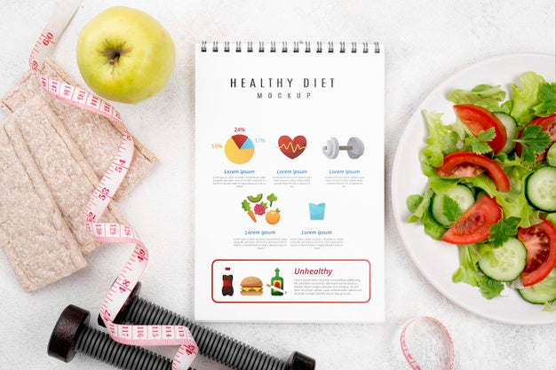 Free Top View Of Fitness Notebook With With Salad And Weights Psd
