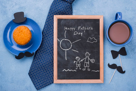 Free Top View Of Frame With Cupcake And Tie For Fathers Day Psd